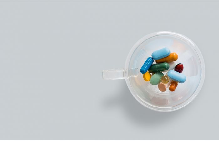 pills in glass jar